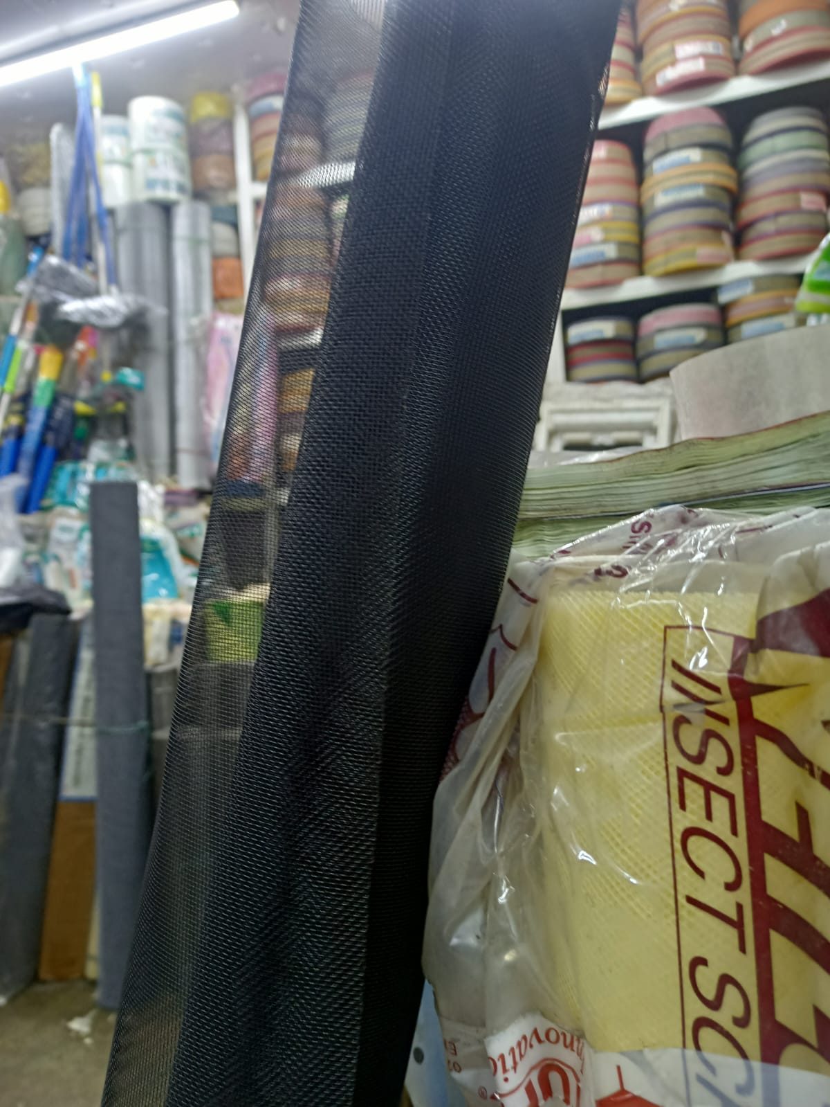 Insect screen mesh and netting stock on the shop floor at Luxmi Narayan Enterprises