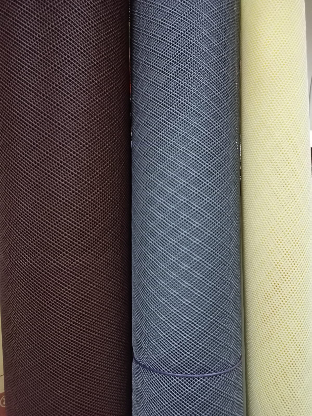Brown, grey and fibreglass mosquito mesh rolls stocked by Luxmi Narayan Enterprises